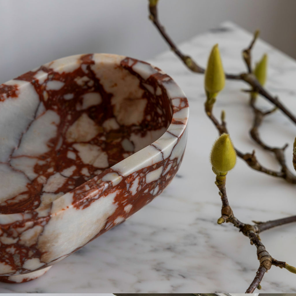 The Muse footed oval tray in Brown Calacatta with elegant design, inspired by Greek artistry, perfect for upscale decor and thoughtful display in luxury interiors