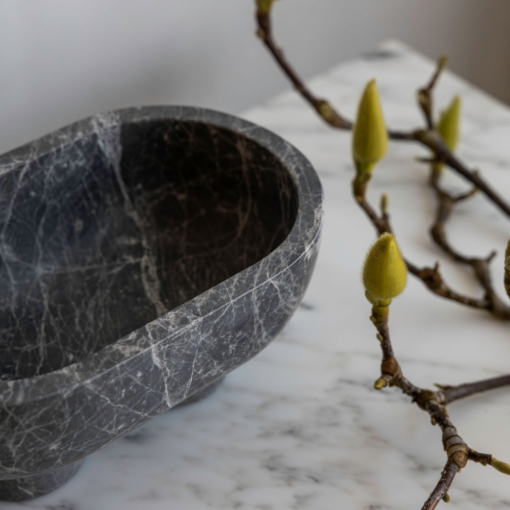 The Muse footed oval tray with elegant design, inspired by Greek artistry, perfect for upscale decor and thoughtful display in luxury interiors