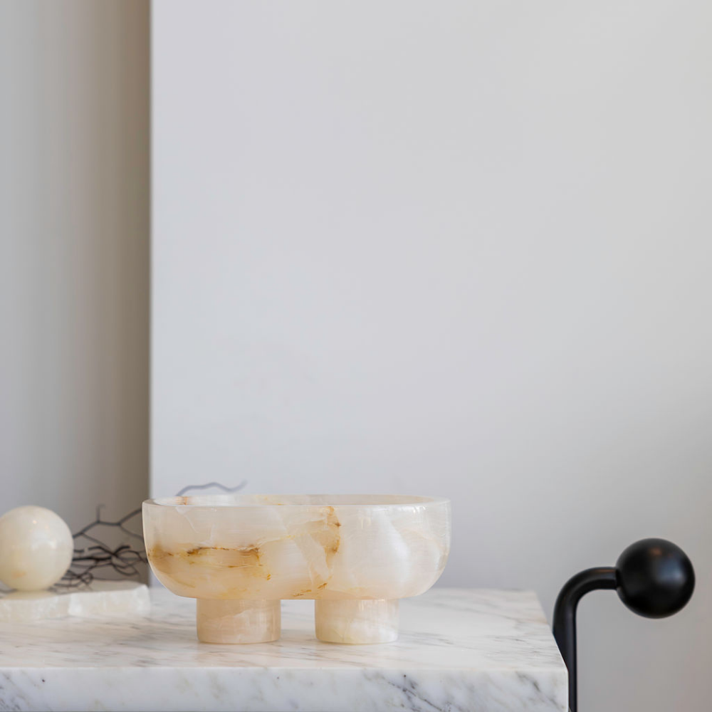 The Muse footed oval tray in White Onyx with elegant design, inspired by Greek artistry, perfect for upscale decor and thoughtful display in luxury interiors