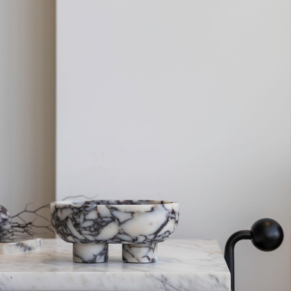 The Muse footed oval tray in Viola Calacatta with elegant design, inspired by Greek artistry, perfect for upscale decor and thoughtful display in luxury interiors