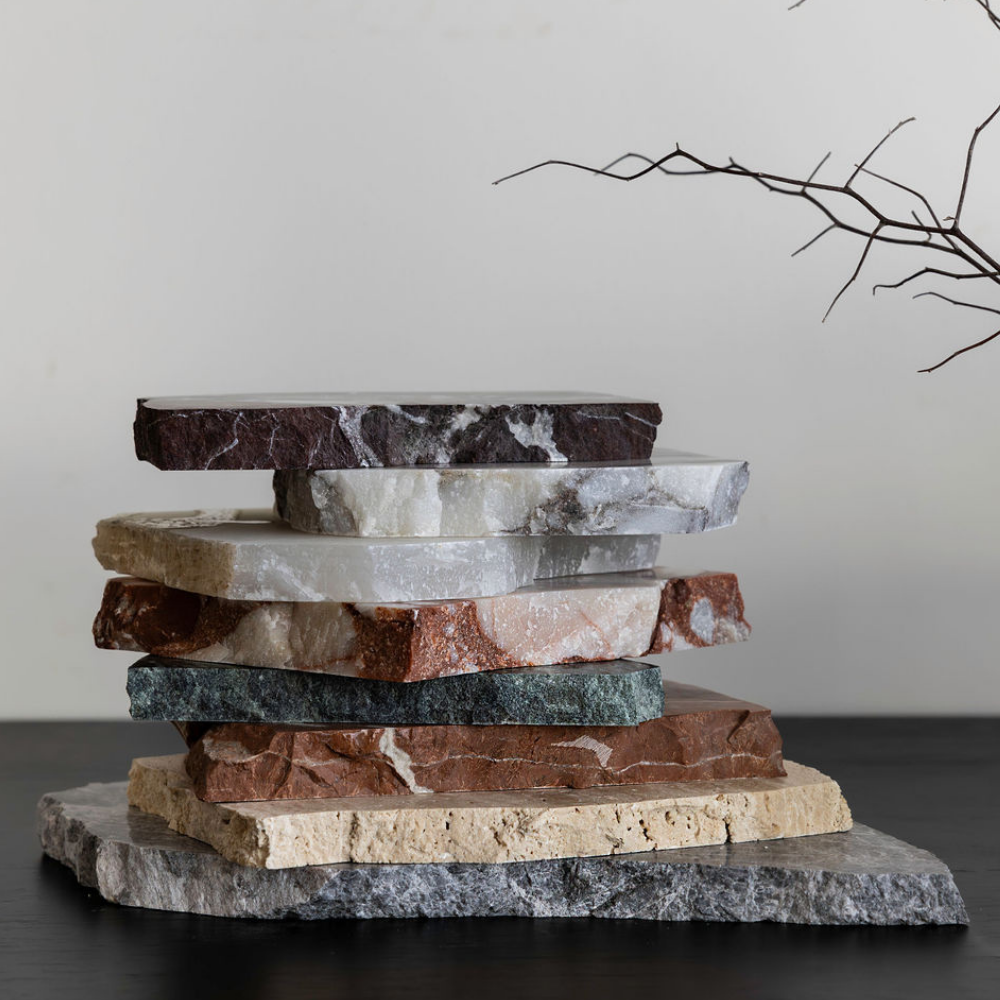 Unique small and medium raw stone offcuts in a variety of colors, perfect for photographers, stylists, and interior decorators looking to add an authentic, one-of-a-kind touch to luxury spaces