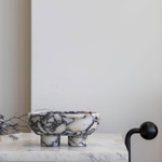 The Muse footed oval tray in Viola Calacatta with elegant design, inspired by Greek artistry, perfect for upscale decor and thoughtful display in luxury interiors