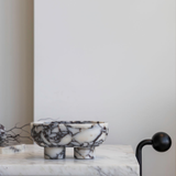 The Muse footed oval tray in Viola Calacatta with elegant design, inspired by Greek artistry, perfect for upscale decor and thoughtful display in luxury interiors