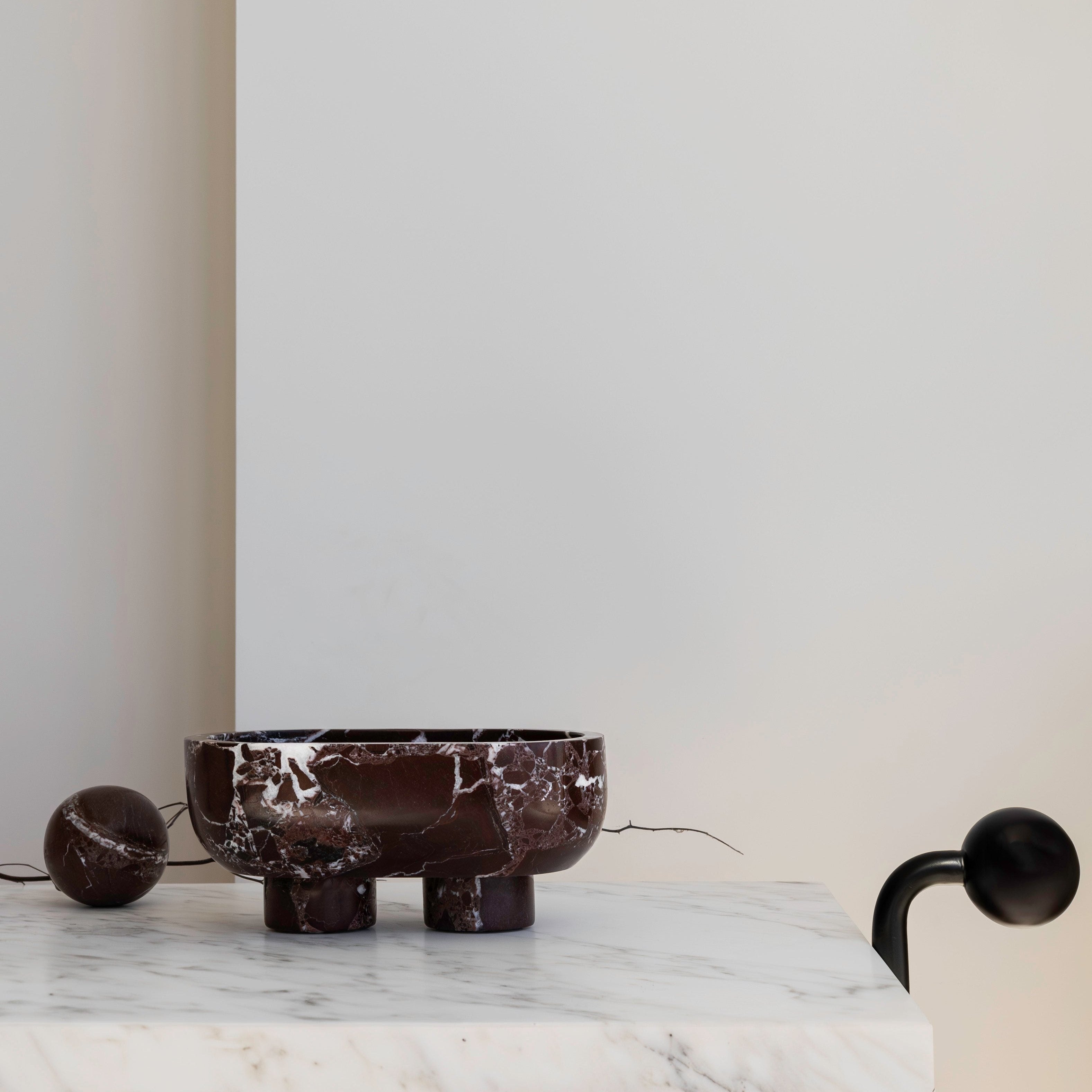 The Muse footed oval tray in Rosso Levanto with elegant design, inspired by Greek artistry, perfect for upscale decor and thoughtful display in luxury interiors