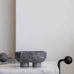 The Muse footed oval tray in Tundra Grey with elegant design, inspired by Greek artistry, perfect for upscale decor and thoughtful display in luxury interiors