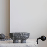 The Muse footed oval tray in Tundra Grey with elegant design, inspired by Greek artistry, perfect for upscale decor and thoughtful display in luxury interiors