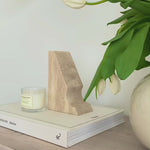 Lunar Sculpted Bookend – Elegant homeware bookend with a unique design. Perfect for adding a touch of celestial charm to bookshelves, offices, or living rooms, blending style and functionality